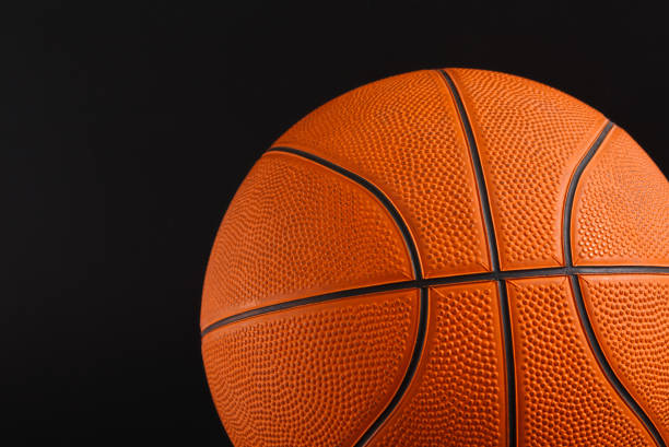 istock Basketball ball on black background copy space 836609922