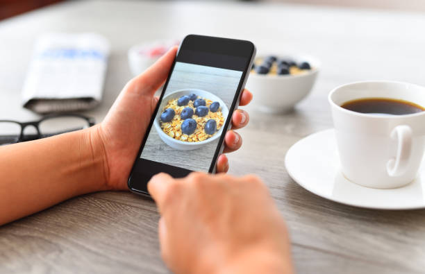istock Taking food photos with smart phone 836612902