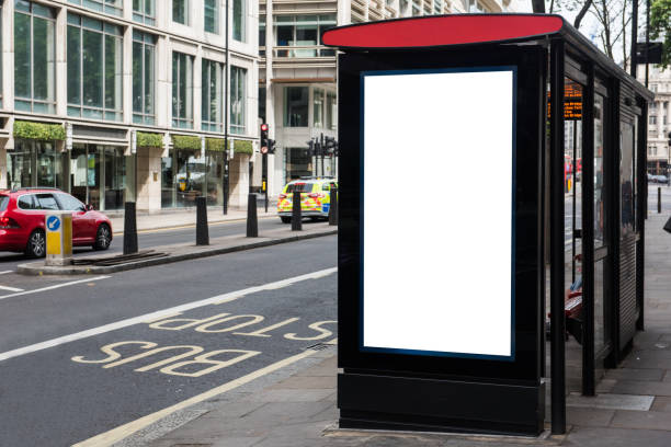 istock Blank public advertising board or placard at a bus stop with copy space 836618036