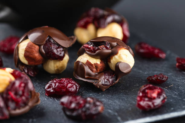 Hazelnut and cranberries in chocolate