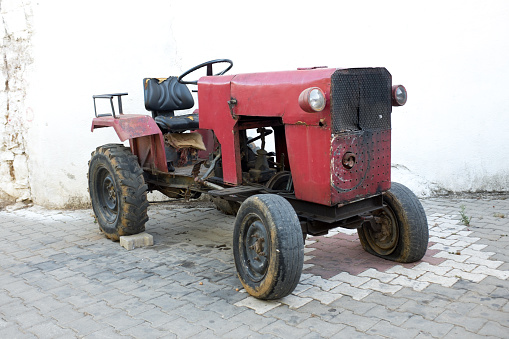 Old scrap tractor, outdoor, white background