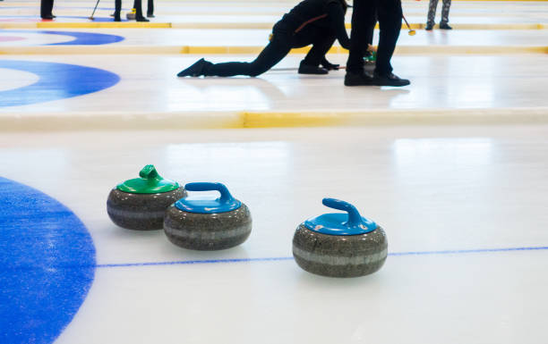 istock Curling sport stones equipment 836634306