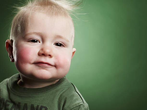 uśmiech dziecka chłopiec 1 roku życia. - one baby boy only zdjęcia i obrazy z banku zdjęć