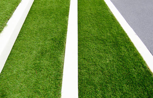 istock Green artificial grass with  stone on white step texture or Sand wash background. 836641044