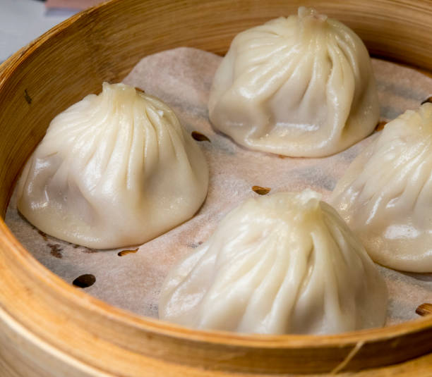 istock Shanghai-style pork dumplings, or Xiaolongbao 836641232