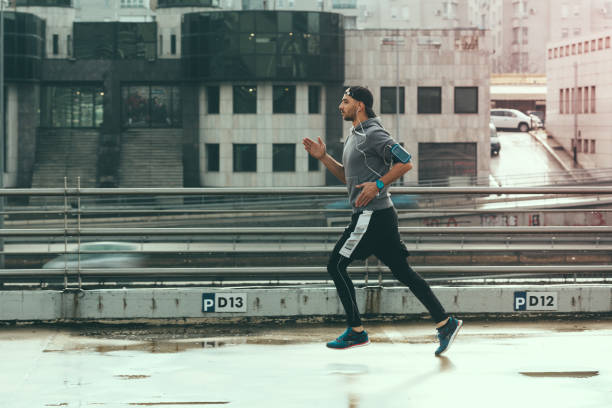 istock Young person running over the parking lot 836649028