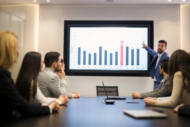 istock Young attractive businessman showing presentation to his colleagues 836654218