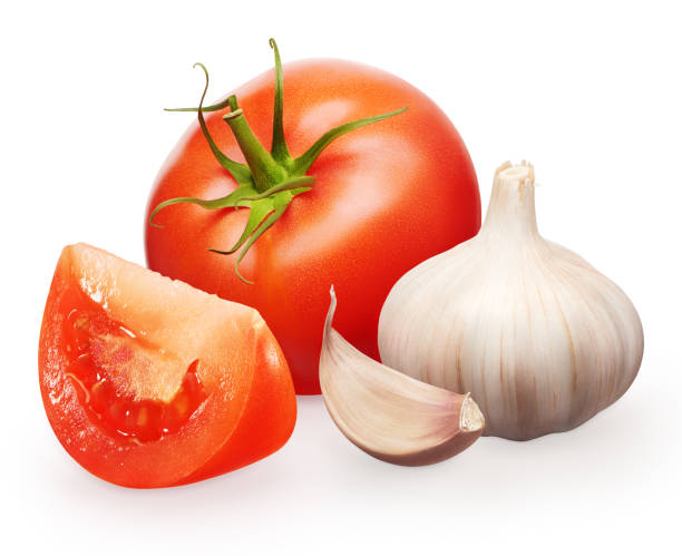 istock Red tomato with green leaf, slice and garlic with clove 836657482