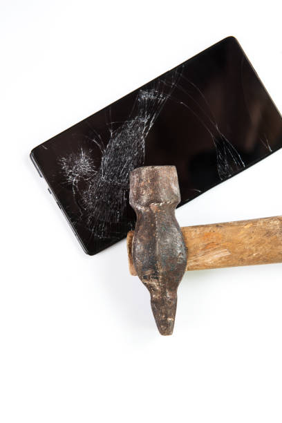 istock An old hammer and smartphone 836661314