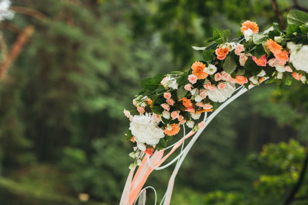 istock Wedding arch decorated with flowers 836661660