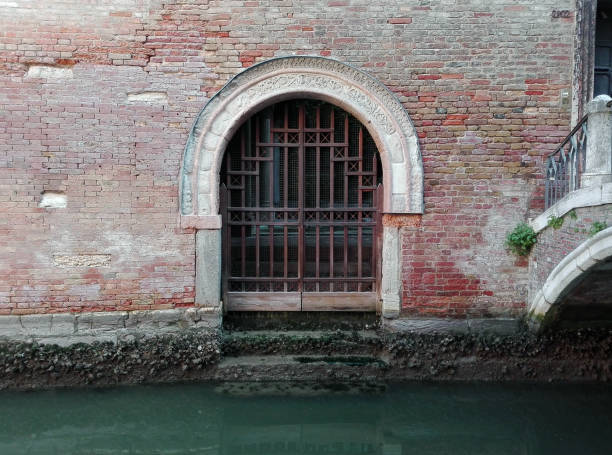 The water entrance to this house on a canal in Venice features a wonderful Byzantine arch from the 13th century.