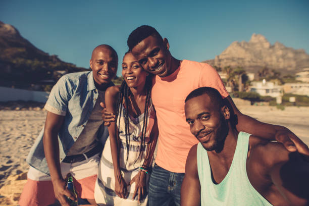 istock Group of friends taking selfie on the seashore. 836661930