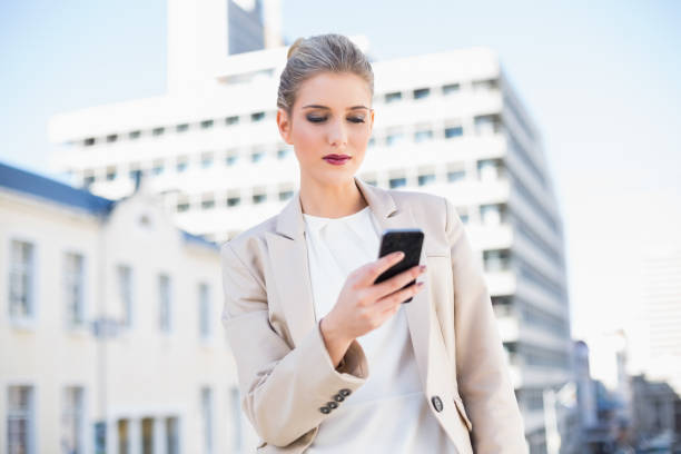 istock Peaceful attractive businesswoman sending a text message 836662726