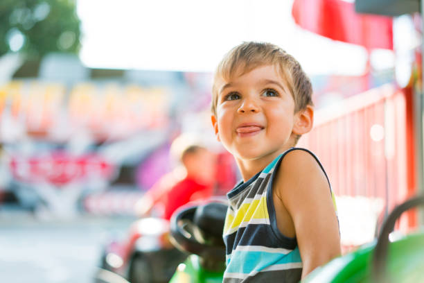 istock happy little boy summer amusement park 836665182