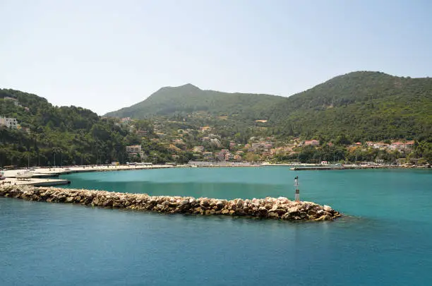 Breakwater and breakwater light at Sami port in Kefalonia , Greece