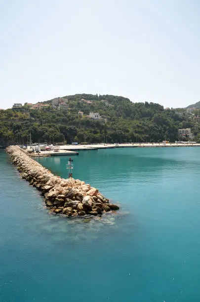 Breakwater and breakwater light at Sami port in Kefalonia , Greece