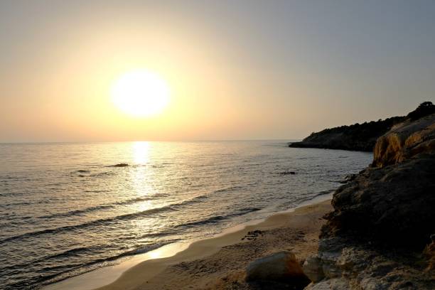 istock Beautifull Sunset over the sea and rocks. 836674590