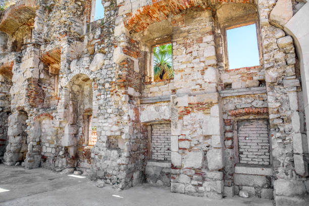 istock The ruins of an old wall with windows. Split 836677200