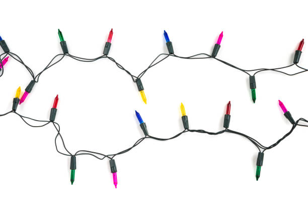 istock Christmas light bulbs on string in multi colours; blue, yellow, red, pink and green isolated on white background, Xmas holiday decoration concept 836684024