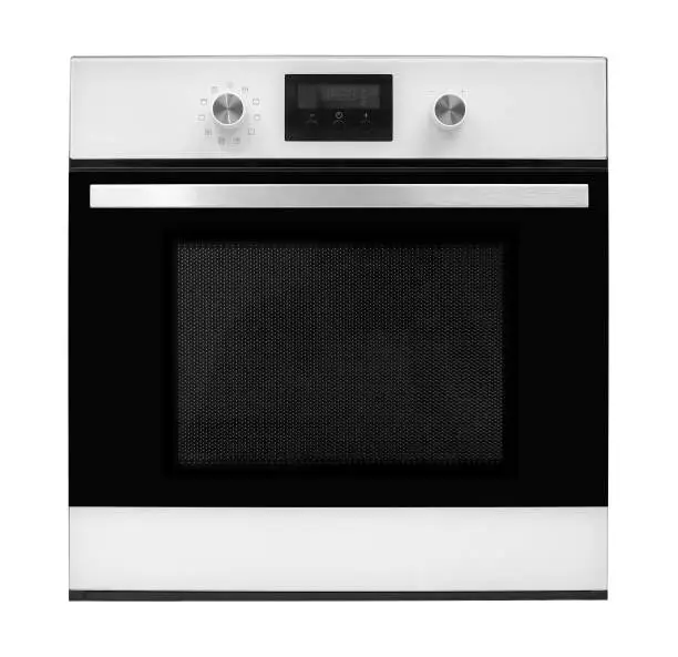 The electric oven on a white background. It is isolated, the worker of paths is present.