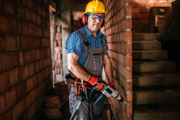 istock Portrait of a man with drill 836689472