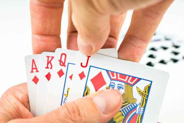 istock Playing cards in poker. Open last cards more - will be an Royal Flush 836691694