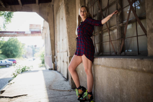 istock Sexy blonde woman with roller skates 836695306