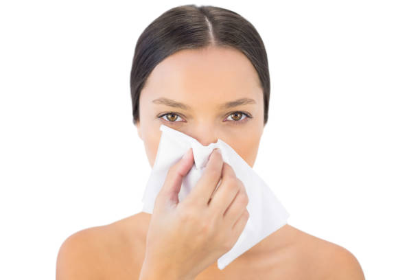 istock Gorgeous woman blowing her nose 836695484