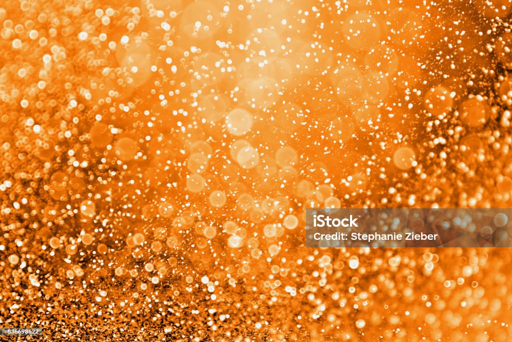 Modern Fall Thanksgiving or Halloween Gala Background Abstract modern dark orange glitter sparkle background for happy birthday invite, spooky Fall Halloween party magic pattern, October kid trick or treat night, fire, Thanksgiving Autumn gala or sale Orange Color Stock Photo