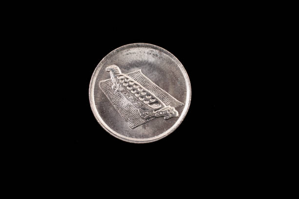 istock Malaysian ten sen coin close up on black 836698882