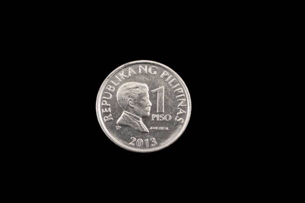 istock Filipino one piso coin close up on black 836698958