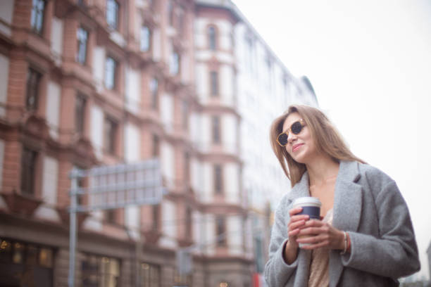 istock Beautiful woman with cup of coffee 836713742