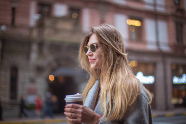 istock Beautiful woman with coffee cup 836713798