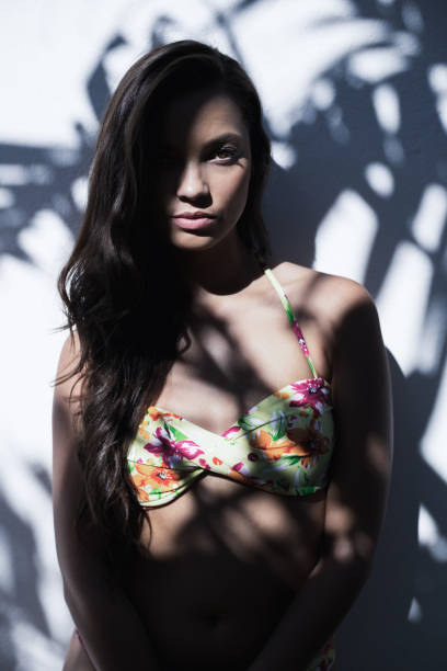 istock Sensual woman in bikini posing 836720058