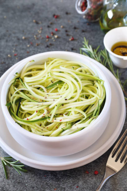 istock Raw zucchini spaghetti and olive oil 836720782