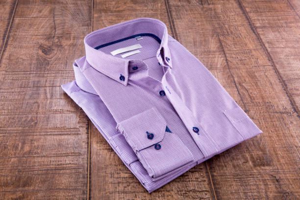 istock Two men's shirts folded on a wooden background 836722774