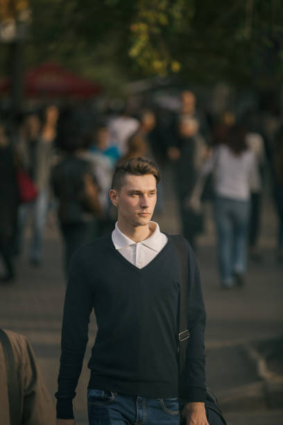 istock Hipster guy walking down the street, urban style 836723258