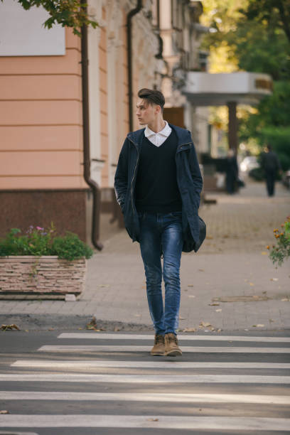istock Hipster guy walking down the street, urban style 836723366