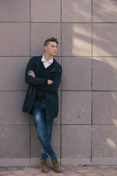 istock Hipster guy walking down the street, urban style 836723972