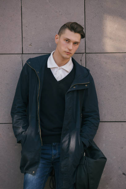 istock Hipster guy walking down the street, urban style 836724312