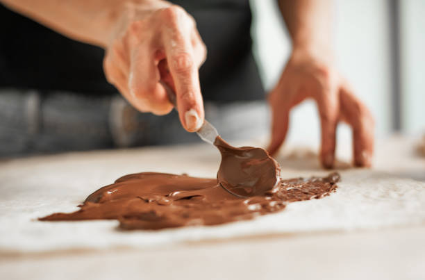 istock Professional confectioner making tasty cake with melted chocolate 836734076