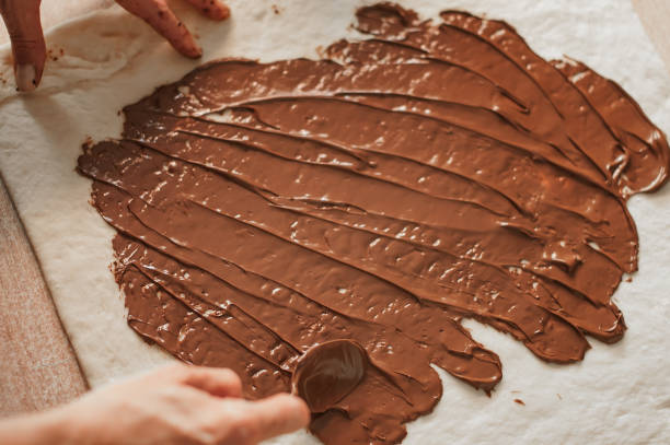 istock Professional confectioner making tasty cake with melted chocolate 836734312