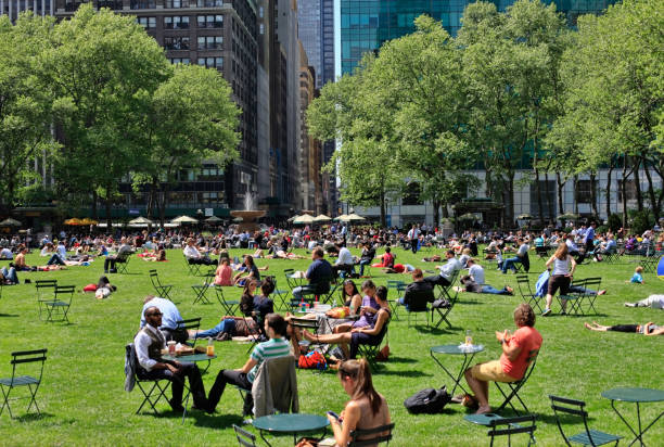 People enjoying a nice day in Bryant Park stock photo