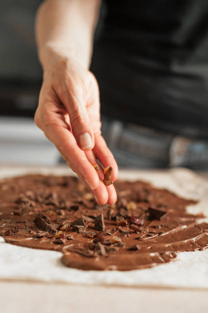 istock Professional confectioner making tasty cake with melted chocolate 836741420