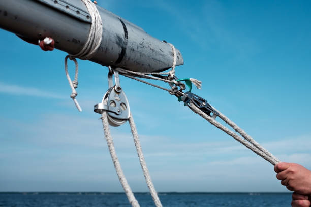 istock Man holding yacht rope cleat 836761232