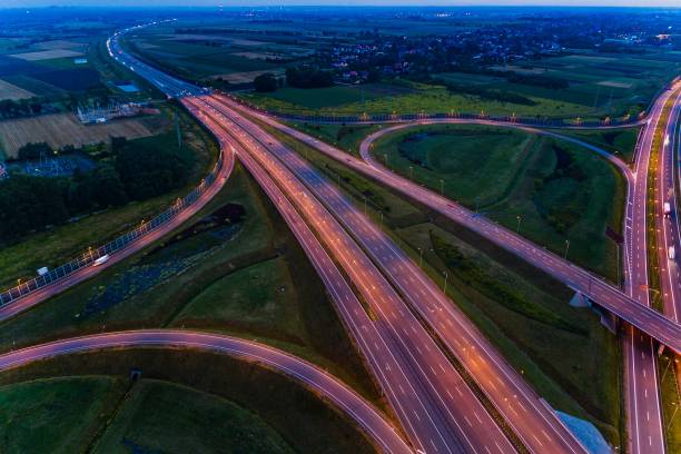 istock Aerial view on evening traffic on motorway junction 836767854