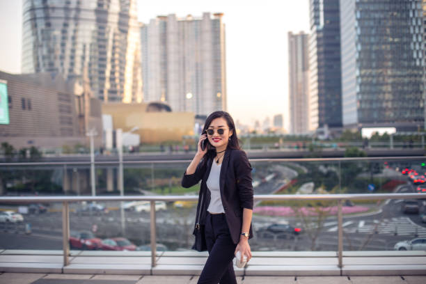 istock Woman talking on phone outdoors 836775004