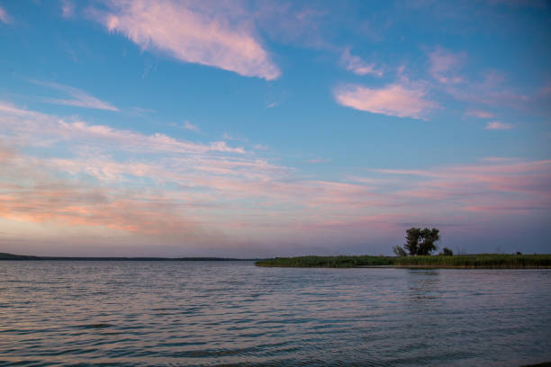 istock Idyllic colorful sunset over lake 836793026