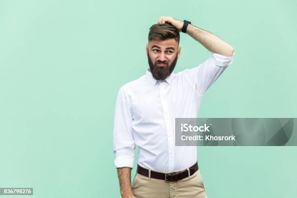Not Sure Young Adult Businessman Have A Doubt Stock Photo - Download Image Now - Confusion, Men, People
