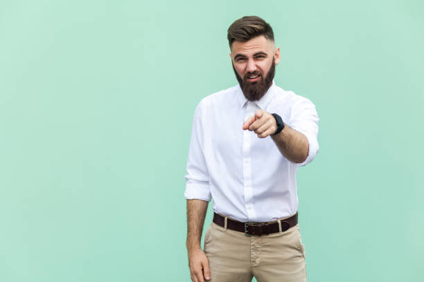 istock The bearded man pointing finger at camera and mockery over someone. 836798432